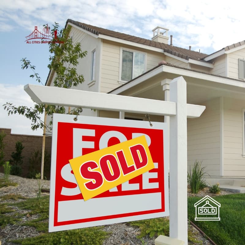 Real estate for sale sign marked sold in front of beautiful home representing professional real estate cleaning services