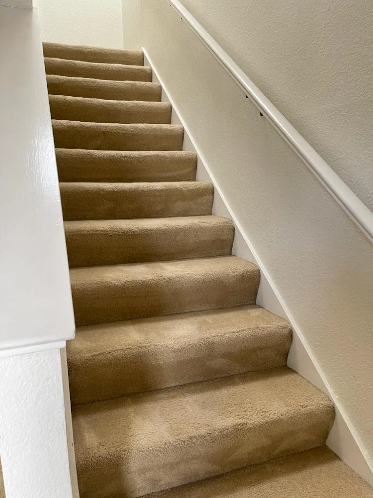 Worn, dirty stair carpet before cleaning and Beatiful and clean stair carpet after professional cleaning